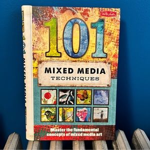 Gently used mixed media book.